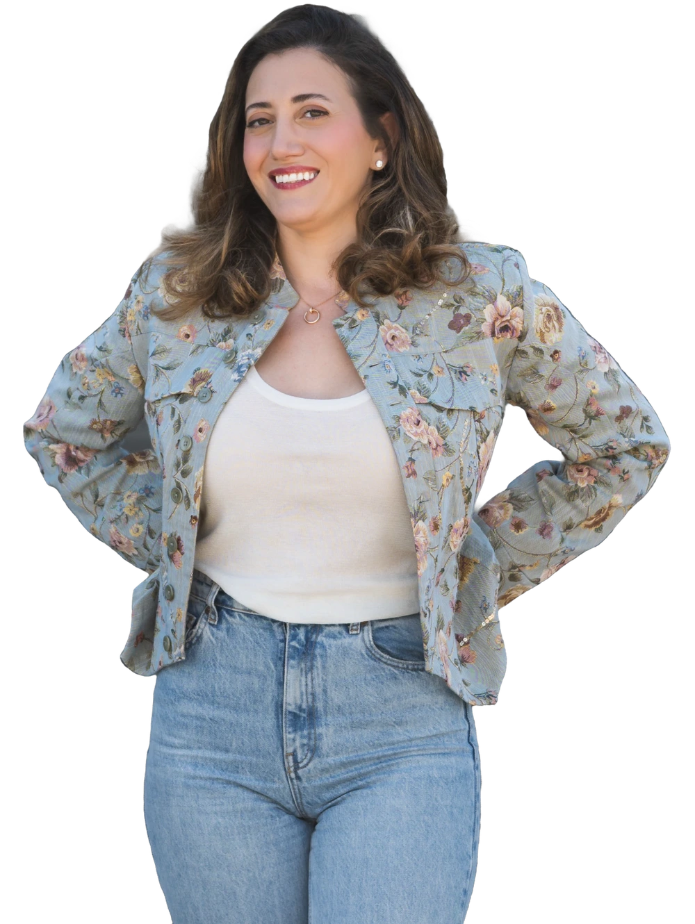 Yasaman Nazhand, certified integrative women's health coach, smiling in a floral jacket
